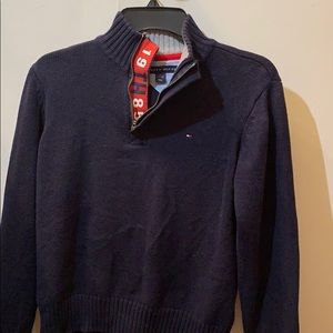A Tommy Hilfiger sweater .